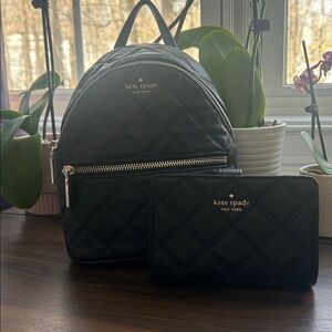 Black and gold Kate Spade matching mini backpack and wallet set